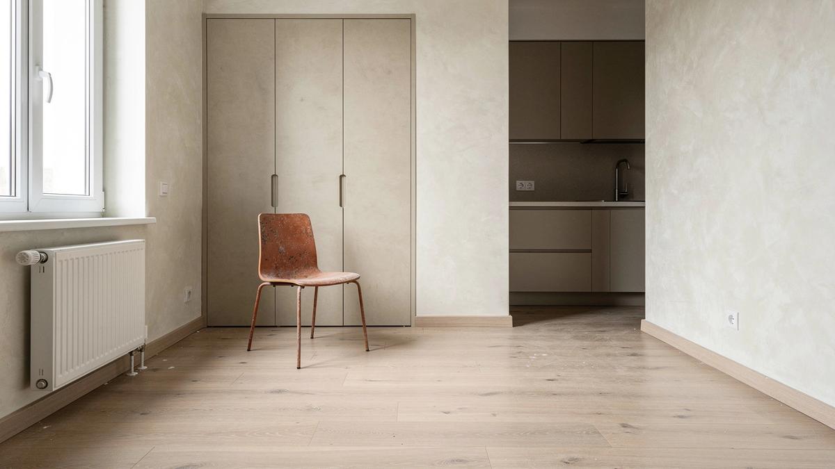 The same kitchen and living area after renovation, held to the identical 6 400 mm dimension line